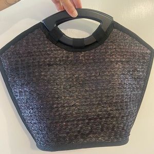 Black woven summer tote with wood handles